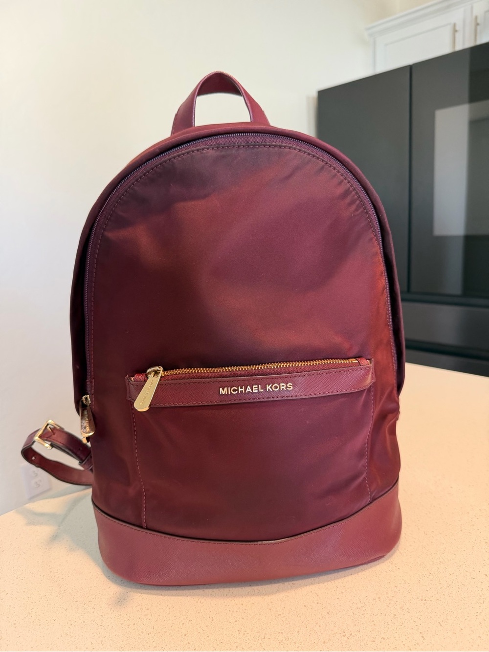 Michael Kors women Maroon Backpack with Gold Hardware